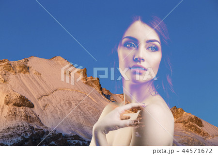 Double exposure portrait of young beautiful woman and mountains. Double exposure portrait of young beautiful woman and mountains. 44571672