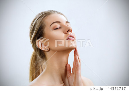 Portrait of sensual woman with blonde hair. 44571717