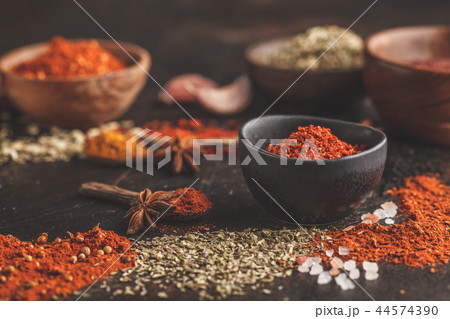 Different kind of spices on dark background. Different kind of spices on dark background. 44574390