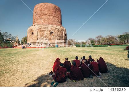 Buddhist monks around Dhamekh Stupa, Sarnath Buddhist monks around Dhamekh Stupa, Sarnath 44576289