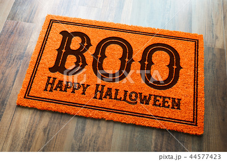 Boo, Happy Halloween Welcome Mat On Wood Floor Boo, Happy Halloween Welcome Mat On Wood Floor 44577423