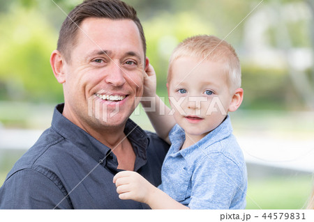 Young Boy Having Fun With His Father At The Park 44579831