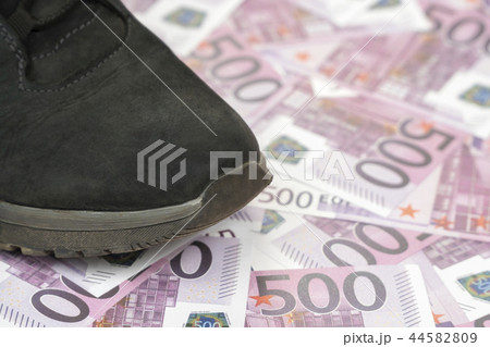 Foot stepped on euro money Foot stepped on euro money 44582809