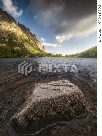 Mountain Lake with Rock in Foreground 44583403