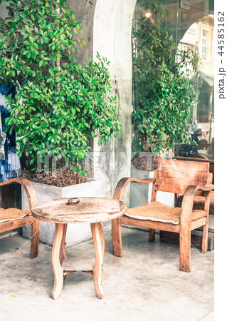 Outdoor patio with empty chair and table Outdoor patio with empty chair and table 44585162