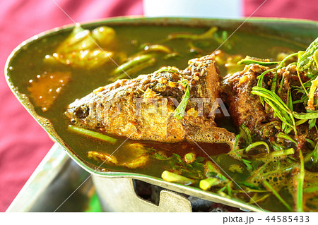 fish sour soup made of tamarind paste, Delicious t 44585433