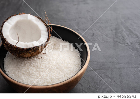 Beautiful composition with coconuts on black background. Copy space. 44586543