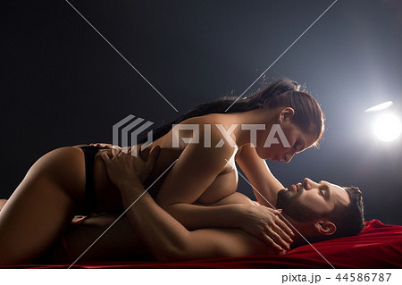 Loving couple embracing in bed shot Loving couple embracing in bed shot 44586787