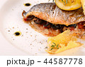 Baked fish stuffed with olives 44587778