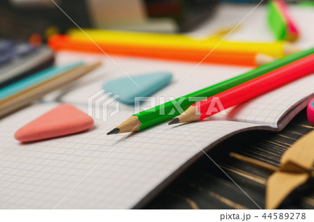 Bright crayons lie on a notebook. Education concepte 44589278