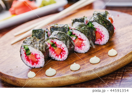 Delicious dishes from the chef on wooden plate 44591354