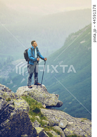 The man on the rock. Walk to the High Tatras, Slovakia. Europe 44591378