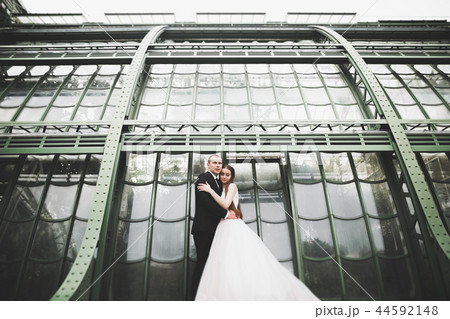 Happy romantic young couple celebrating their marriage. Outdoor 44592148