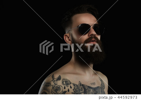 Handsome Bearded Man in sunglasses Handsome Bearded Man in sunglasses 44592973