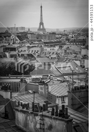 The roofs of Paris and its chimneys under a clouds sky The roofs of Paris and its chimneys under a clouds sky 44595153