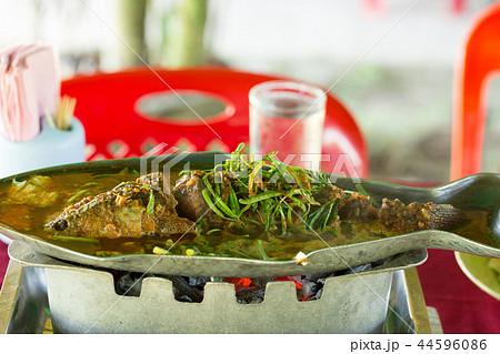 fish sour soup made of tamarind paste 44596086