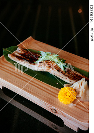 Unagi sushi on wood plate, large piece Japanese Unagi sushi on wood plate, large piece Japanese 44598833