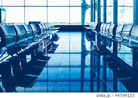 international airport terminal with empty seats 44599123