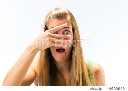 Portrait of afraid young woman Portrait of afraid young woman 44600049