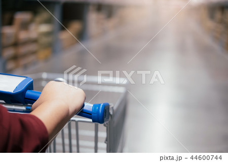 Man using trolley cart. Man using trolley cart. 44600744
