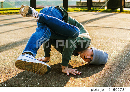 Dancer man in work on asphalt Dancer man in work on asphalt 44602784
