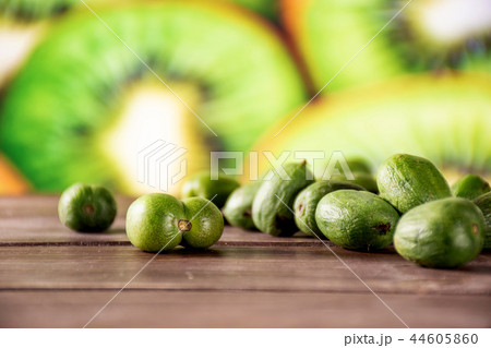 Fresh green mini baby kiwi fruit with sliced kiwi Fresh green mini baby kiwi fruit with sliced kiwi 44605860