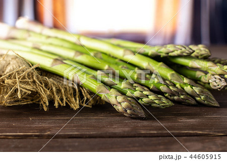 Fresh green asparagus spear with curtains Fresh green asparagus spear with curtains 44605915
