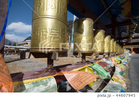 Buddhist prayer wheels in a Tibetan monastery 44607945