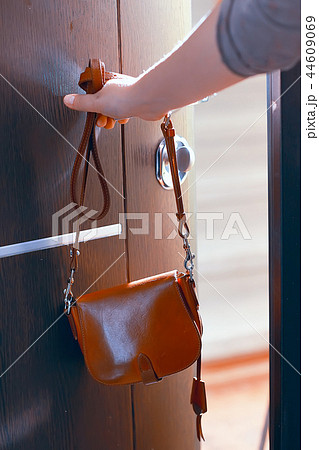 women's bag at the door 44609069