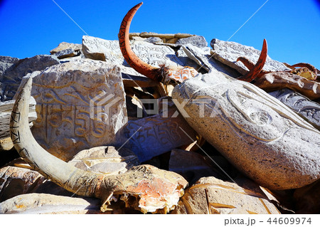 Buddhist religious symbols inscriptions in Tibet old runes Buddhist religious symbols inscriptions in Tibet old runes 44609974