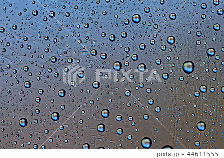 gray wet background / raindrops to overlay on the window, weather, background drops of water rain on the glass transparent gray wet background / raindrops to overlay on the window, weather, background drops of water rain on the glass transparent 44611555