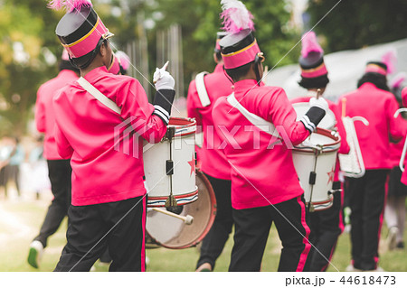 Marching band drummers perform in school parade 44618473