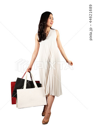 Shopaholic woman with a shopping bags Shopaholic woman with a shopping bags 44621689