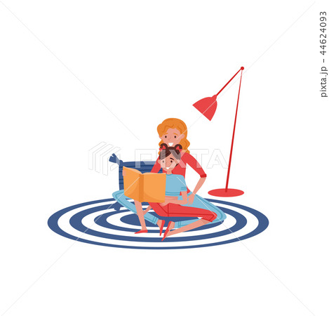 Mother reading book to her daughter. Cute girl and young woman sitting on carpet at home. Flat 44624093
