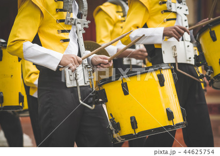 Marching band drummers perform in school parade Marching band drummers perform in school parade 44625754