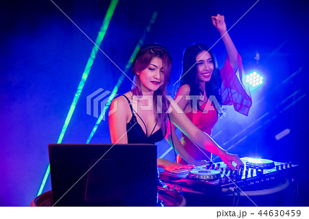 Music Concepts. DJ is rhythm music with Controller and mixer. DJ 44630459