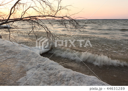 Ice in a freezing river in the fall at sunset Ice in a freezing river in the fall at sunset 44631289