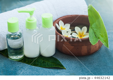 Flowers , towel and cream tubes for relax room 44632142