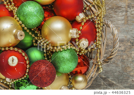 Christmas balls red, gold, green, beads lie in Christmas balls red, gold, green, beads lie in 44636325
