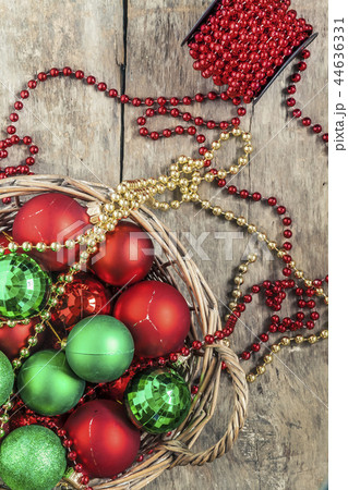 Christmas balls red, gold, green, beads lie in Christmas balls red, gold, green, beads lie in 44636331