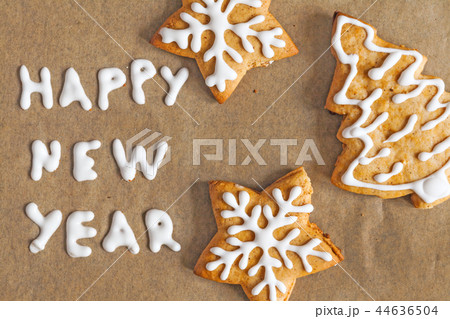 Christmas gingerbread cookies on a parchment 44636504
