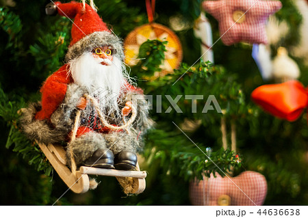 Santa Claus on a sledge toy on Christmas tree 44636638