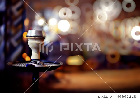 hookah in the restaurant / hookah elements on the background of a blurry interior of the restaurant, a cafe with a bokeh 44645229