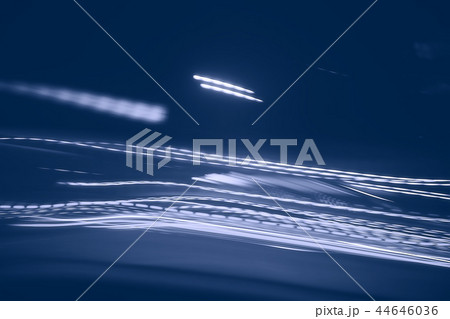 traces of headlights glow / blurred background nocturnal traces of light, texture of a night city 44646036