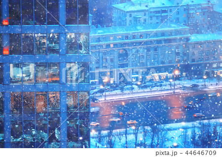 snow in a night city skyscrapers / seasonal landscape winter city, snowfall against a background of skyscrapers 44646709