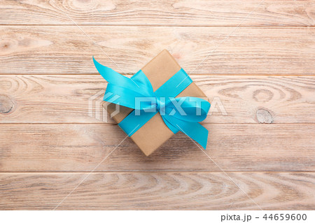 Vintage gift box on wooden background Vintage gift box on wooden background 44659600