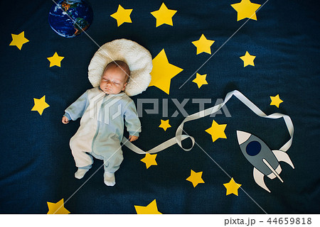 sleeping baby boy on a background of the starry sky sleeping baby boy on a background of the starry sky 44659818
