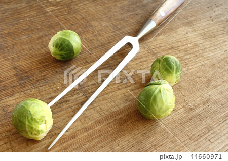 fresh brussels sprouts on a wooden board fresh brussels sprouts on a wooden board 44660971