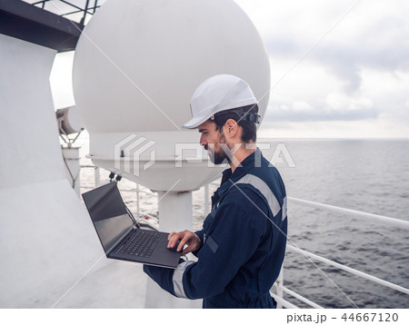 Service technician or serviceman near VSAT terminal Service technician or serviceman near VSAT terminal 44667120