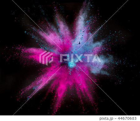 Colored powder explosion on black background. Colored powder explosion on black background. 44670683